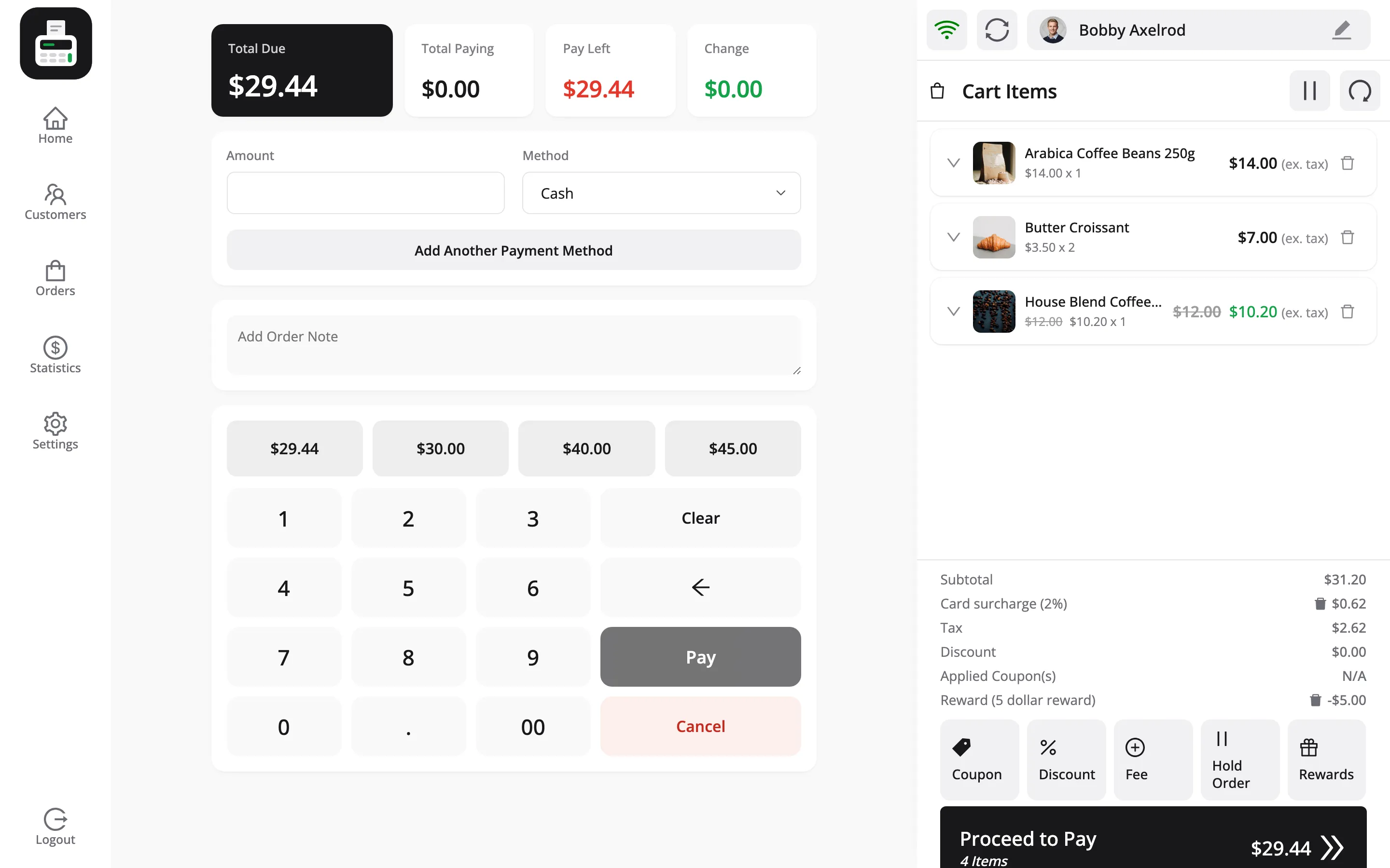 The POS payment screen with the total due, payment methods and numeric keypad