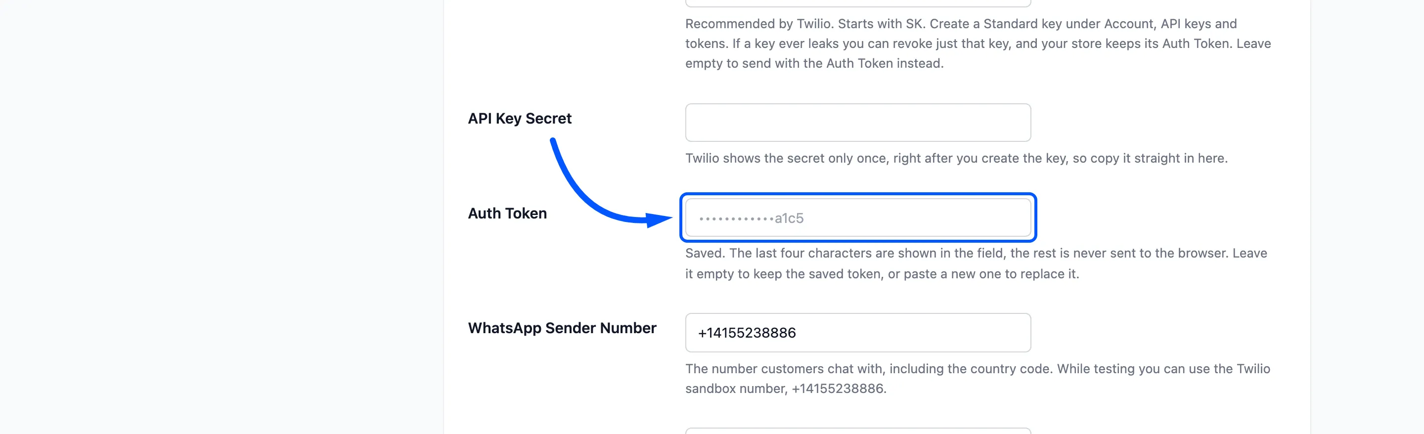 The Auth Token field boxed on the Twilio tab